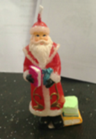 Свеча Дед Мороз с книгами